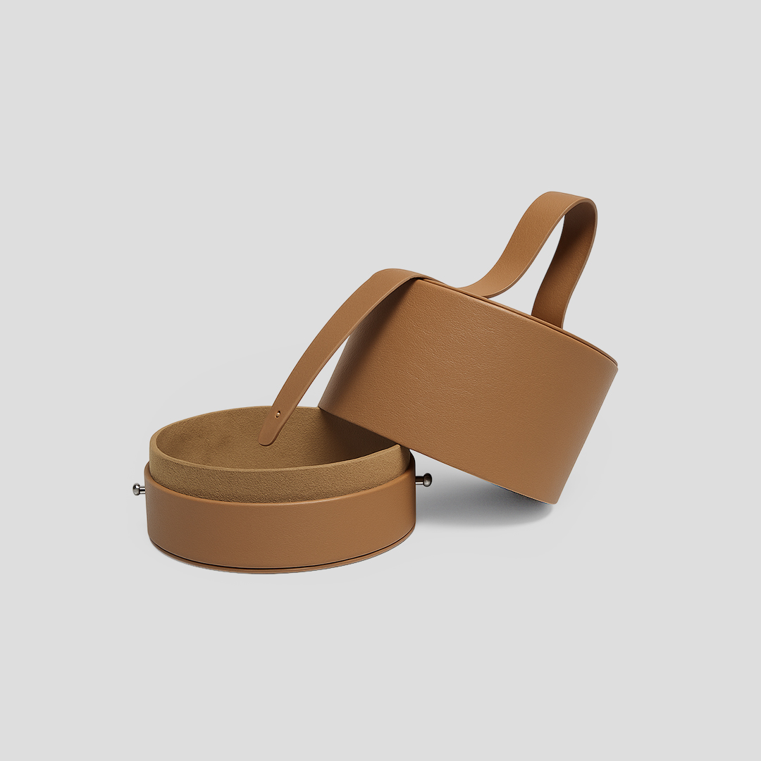 Coffret rond simili cuir marron ouvert, idéal comme boîte de rangement élégante pour bijoux et petits accessoires, ou comme coffret cadeau personnalisable.